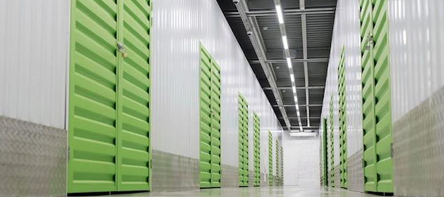 View of a storage facility showing doors to individual storage units