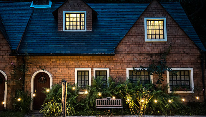 Beautiful red brick house with decorative lights