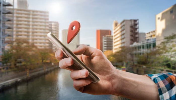 Side view hand holding smartphone