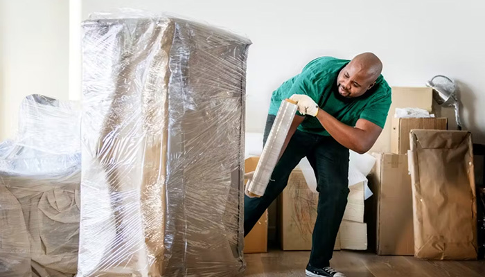 Clutter mover packing items before moving