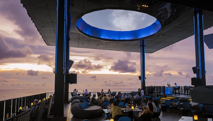 People are hanging out at a rooftop restaurant in Dupont Circle.