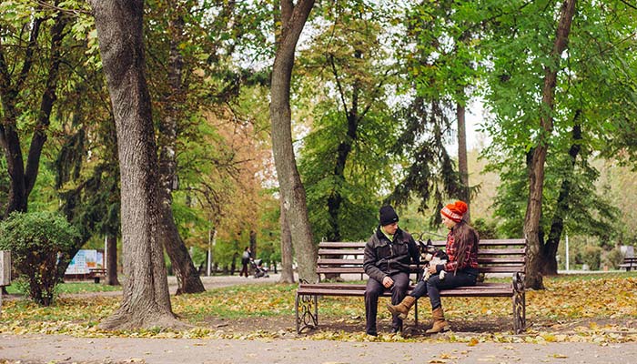 couple hanging out in a park
