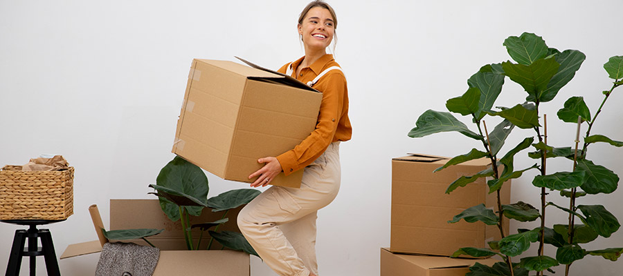 young woman moving into a new home