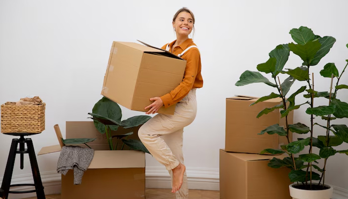 young woman moving to her new house