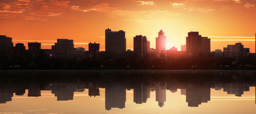 view of city with sunset