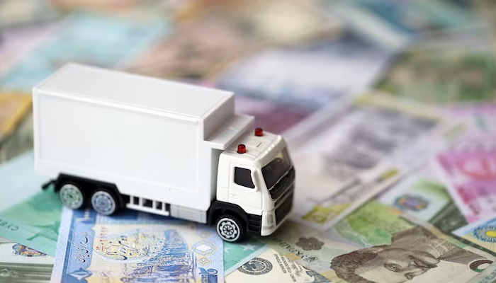 delivery truck over bank notes