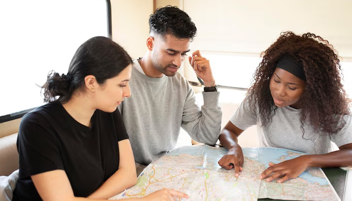 people looking at map for planning for a move